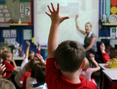 School summer holidays in England should be cut to four weeks, report says