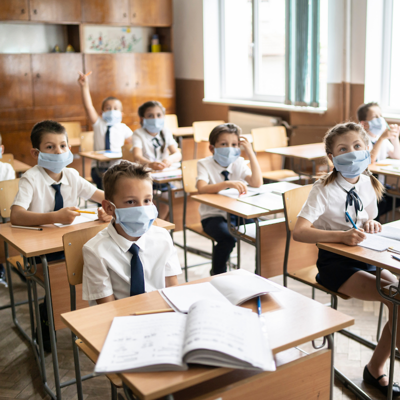Ministers set to decide on an overhaul of self-isolation rules as one in 20 children in England missed school due to Covid within the last week