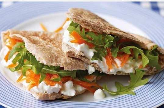 Cottage cheese, grated carrot and rocket pittas